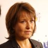 Carole Rousseau - Courtier d'un jour pour encourager les clients à passer ce jour là le maximum d'ordres dans la salle des marchés d'Aurel BGC Rue Vivienne à Paris. Le 11 septembre 2014.