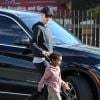 Exclusif - Charlize Theron est allé chercher son fils Jackson à son cours de danse. Le petit jackson porte des tennis "Tortues Ninja" Le 3 mars 2015