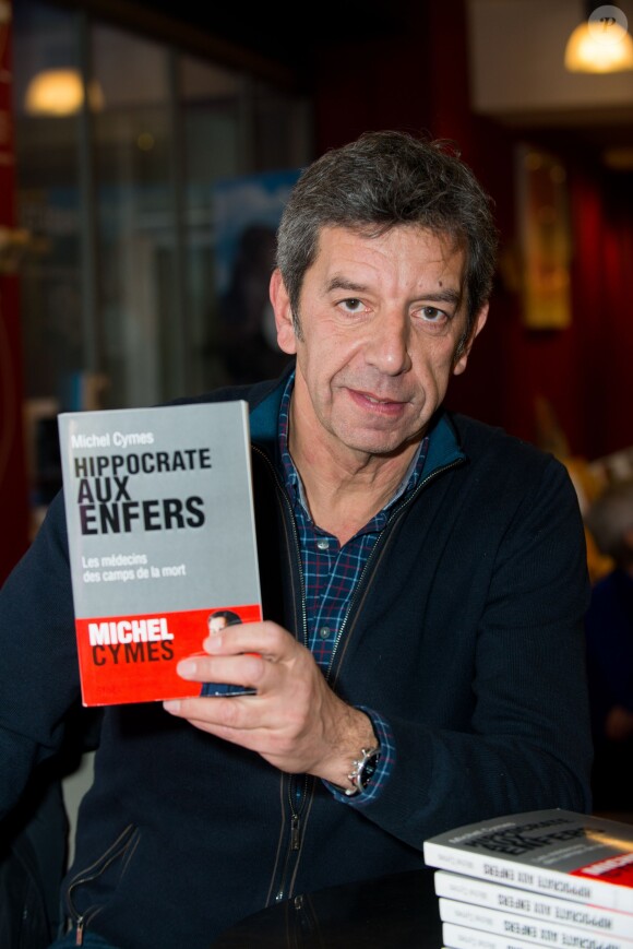 Michel Cymes présente son ouvrage "Hippocrate aux enfers" à Bruxelles, le 13 février 2015.