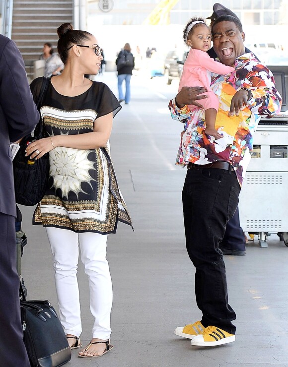 Tracy Morgan avec sa compagne Megan et sa fille Maven en mars 2014 à l'aéroport de Los Angeles.