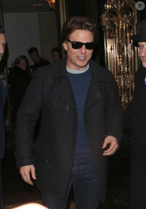 Tom Cruise à la sortie du restaurant Scotts à Londres, le 11 février 2015