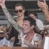 Exclusif - Tommy Lee et sa fiancée Sofia Toufa profitent de leurs vacances à Saint-Barthélemy. Le couple a fait la fête au Nikki Beach le 5 avril 2015