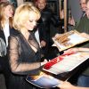 Pamela Anderson à la sortie de Crossroads, un restaurant vegan à West Hollywood le 7 mai 2015 