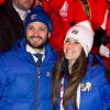 Le prince Carl Philip de Suède et sa fiancée Sofia Hellqvist lors de l'ouverture des championnats du monde de ski nordique à Falun en Suède le 18 février 2015.