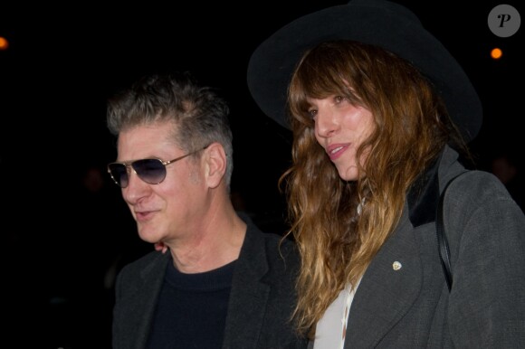 Etienne Daho et Lou Doillon au défilé Saint Laurent à Paris, le 4 mars 2013.