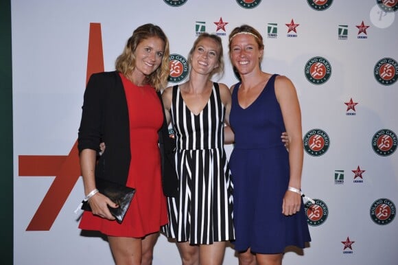 Julie Coin, Mathile Johansson et Pauline Parmentier lors de la soirée des joueurs de Roland-Garros au premier étage de la Tour Eiffel, à Paris le 21 mai 2015
