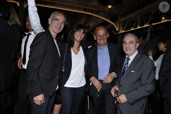 Raymond Domenech, Estelle Denis, Jean-Michel Apathie et Jean Gachassin lors de la soirée des joueurs de Roland-Garros au premier étage de la Tour Eiffel, à Paris le 21 mai 2015