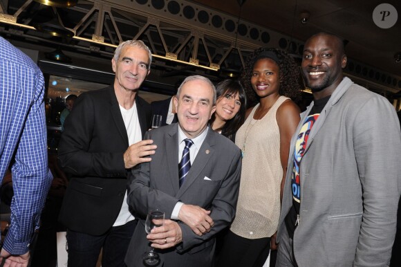 Raymond Domenech, Jean Gachassin, Estelle Denis, Muriel Hurtis, Ladji Doucouré lors de la soirée des joueurs de Roland-Garros au premier étage de la Tour Eiffel, à Paris le 21 mai 2015