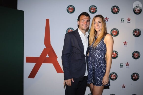 Alizé Cornet et Enzo Py lors de la soirée des joueurs de Roland-Garros au premier étage de la Tour Eiffel à Paris le 21 mai 2015