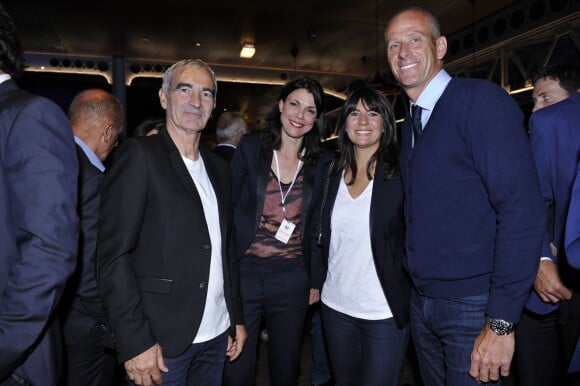 Raymond Domenech, Alexandre Sophie, Estelle Denis lors de la soirée des joueurs de Roland-Garros au premier étage de la Tour Eiffel à Paris le 21 mai 2015