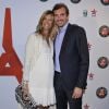 Jérémy Chardy et son épouse Karen, enceinte, lors de la soirée des joueurs de Roland-Garros au premier étage de la Tour Eiffel à Paris le 21 mai 2015