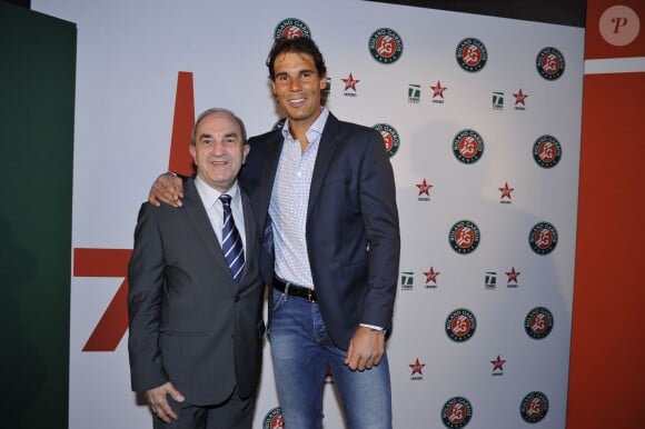 Rafael Nadal et Jean Gachassin lors de la soirée des joueurs de Roland-Garros, au premier étage de la Tour Eiffel, le 21 mai 2015 à Paris