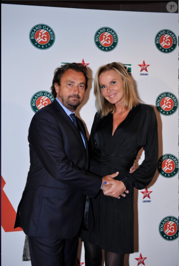 Henri Leconte et Florentine lors de la soirée des joueurs de Roland-Garros, le 21 mai 2015 au premier étage de la Tour Eiffel à Paris