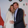 Julien Benneteau et sa compagne Karen, enceinte, lors de la soirée des joueurs de Roland-Garros, le 21 mai 2015 au premier étage de la Tour Eiffel à Paris