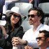 Marie Drucker et son compagnon Mathias Vicherat (directeur de cabinet d'Anne Hidalgo) in love dans les tribunes des Internationaux de France de tennis de Roland Garros à Paris le 30 mai 2015.