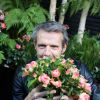 Lambert Wilson baptise la rose qui porte son nom lors de la manifestation "Jardin Jardin" aux Tuileries à Paris, le 3 juin 2015.