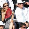 Manuel Valls et sa compagne Anne Gravoin dans les tribunes de Roland-Garros lors de la finale homme, le 7 juin 2015 à Paris