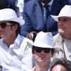 Alexandre Bompard et Claude Lelouch dans les tribunes de Roland-Garros lors de la finale homme, le 7 juin 2015 à Paris