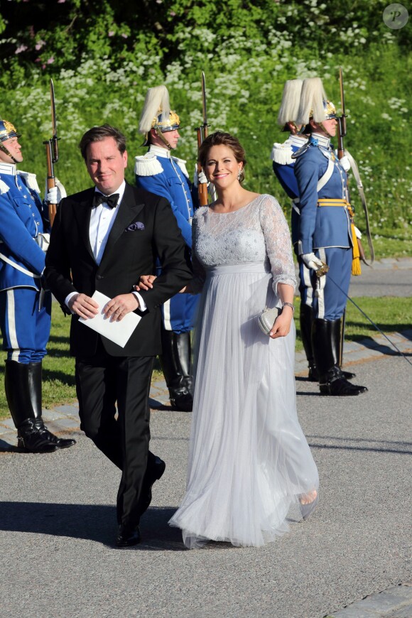 La princesse Madeleine, enceinte de huit mois, lors de son arrivée avec son mari Christopher O'Neill à Skeppsholmen pour le dîner de répétition du mariage du prince Carl Philip de Suède et Sofia Hellqvist, le 12 juin 2015 à Stockholm.