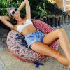 Candice Swanepoel se prélasse en vacances