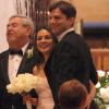 Mila Kunis (enceinte?) entre son pere, Mark Kunis et son petit ami Ashton Kutcher - Mila Kunis et Ashton Kutcher assistent au mariage du frere aine de Mila, Michael, avec la danseuse Alexandra Blacker en la cathedrale de Saint Peter a St Petersbourg en floride, le 7 décembre 2013