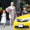 Exclusif : L'actrice américaine Kelly Rutherford avec ses enfants Helena et Hermes font des courses dans un magasin de jouets avant de revenir à leur immeuble à New York le 5 Juillet 2015. Après 3 ans de lutte, l'actrice Kelly Rutherford a enfin retrouvé ses enfants. Elle a obtenu de passer l'été avec eux aux États-Unis. Pour Kelly Rutherford, l'attente est désormais terminée. Daniel Giersch, son ex-mari, avait obtenu la garde en 2012 et les avait emmenés vivre avec lui à Monaco. En mai dernier, la justice américaine était revenue sur cette décision. Kelly Rutherford avait alors obtenu la garde exclusive, de Hermes, 8 ans et Helena, 5 ans. Daniel Giersch était lui accusé de n'avoir pas respecté ses obligations en matière de garde en empêchant leur mère de les voir.#