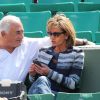 Dominique Strauss Kahn et sa compagne Myriam L'Aouffir dans les tribunes des Internationaux de France de tennis de Roland Garros le 30 mai 2015 à Paris