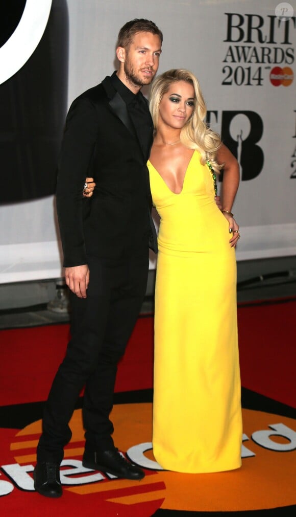 Rita Ora et son petit-ami Calvin Harris - Personnalités arrivant à la soirée des "Brit Awards 2014" en partenariat avec MasterCard à Londres, le 19 février 2014. 