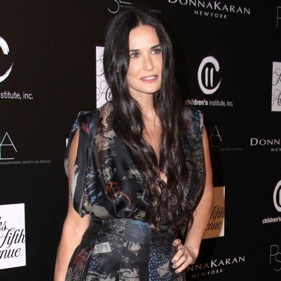 Demi Moore (robe Donna Karan) - People à la 5e soirée annuelle "PSLA Autumn Party" à Los Angeles, le 8 octobre 2014. 