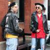 Rita Ora, son compagnon Ricky Hil, Tommy Hilfiger et l'artiste français Mr Brainwash sortent de leur hôtel dans la quartier de Soho à New York, le 20 avril 2015