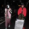 Rita Ora et son compagnon Ricky Hilfiger de retour à l'aéroport de Londres après avoir passé des vacances dans les Caraïbes - Le 3 janvier 2015 