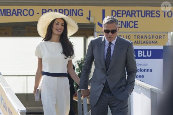 Les mariés George Clooney et Amal Alamuddin quittant Venise, le 29 septembre 2014 après leur mariage civil
