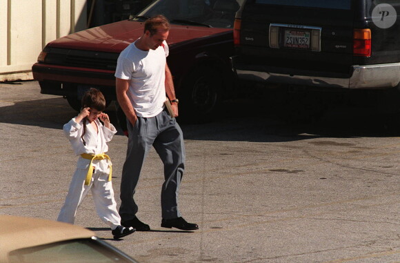 Nicolas Cage et son fils Weston Cage à Los Angeles le 1er janvier 1996. 