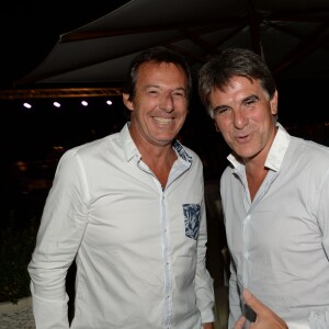 Exclusif - Jean-Luc Reichmann et Tex (Jean-Christophe Le Texier) - Soirée Marcel Campion à la plage La Bouillabaisse à Saint-Tropez, le 5 août 2015.