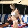 Arrow star Katie Cassidy shows off her toned body as she spends the day with a friend at the hotel pool in Miami Beach, FL, USA on August 08, 2015. Photo by GSI/ABACAPRESS.COM09/08/2015 - Miami Beach