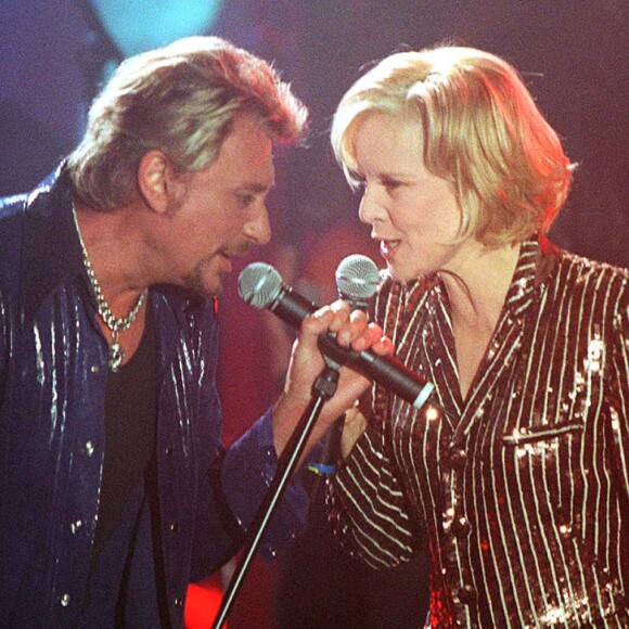 Johnny Hallyday et Sylvie Vartan sur scène en 1998. 
