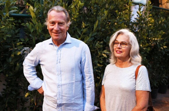 William Leymergie et son épouse à la representation de Julien Clerc dans le cadre du festival de Ramatuelle le 3 août 2013.