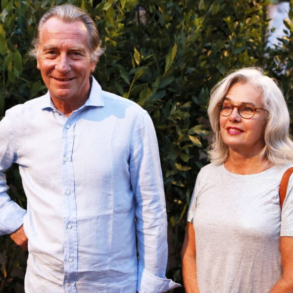 William Leymergie et son épouse à la representation de Julien Clerc dans le cadre du festival de Ramatuelle le 3 août 2013.