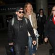 Cameron Diaz et son mari Benji Madden lors de leur arrivée à l'aéroport LAX de Los Angeles, le 31 août 2015