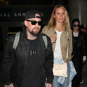 Cameron Diaz et son mari Benji Madden lors de leur arrivée à l'aéroport LAX de Los Angeles, le 31 août 2015