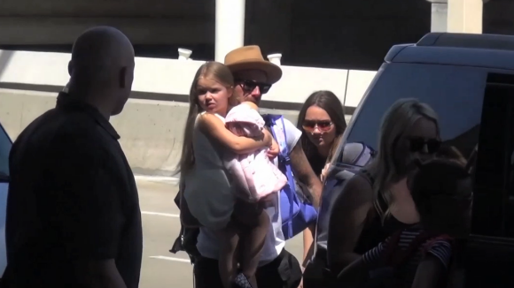 David, Victoria Beckham et leurs enfants à l'aéroport de Los Angeles, le 31 août 2015 avant leur vol retour pour Londres