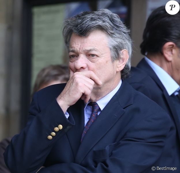 Jean-Louis Borloo à la sortie des obsèques de Patrice Dominguez en la basilique Sainte Clotilde à Paris le 16 avril 2015