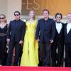 John Travolta et sa femme Kelly Preston, Uma Thurman, Quentin Tarantino, Lawrence Bender, Harvey Weinstein lors du 67e Festival du film de Cannes le 23 mai 2014.