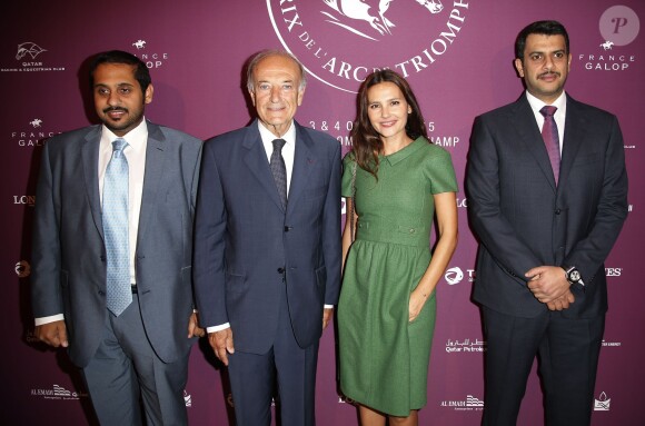 Bertrand Bélinguier (président de France Galop) et Virginie Ledoyen entre guest - Soirée de lancement du Qatar Prix de l'Arc de Triomphe 2015, le Championnat du Monde des Pur-Sang à l'Arc de Triomphe à Paris, le 15 septembre 2015.