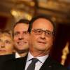 Emmanuel Macron et François Hollande - Remise du Prix de l'Audace Créatrice à Jean-Claude Maillard, PDG et fondateur du groupe Figeac Aéro, au palais de l'Elysée à Paris, le 15 septembre 2015.