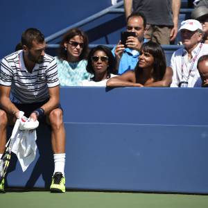 Shy'm sous le charme de Benoît Paire, à moins que ce ne soit l'inverse, lors du huitième de finale du Français à l'US Open à l'USTA Billie Jean King National Tennis Center de Flushing dans le Queens à New York le 6 septembre 2015