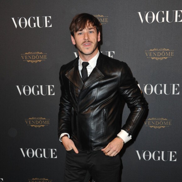 Gaspard Ulliel assiste à la soirée des 95 ans du magazine Vogue Paris, avenue d'Iéna. Paris, le 3 octobre 2015.