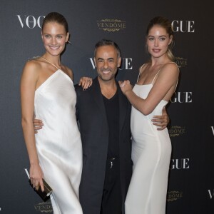 Constance Jablonski, Doutzen Kroes et Francisco Costa assistent à la soirée des 95 ans du magazine Vogue Paris, avenue d'Iéna. Paris, le 3 octobre 2015.