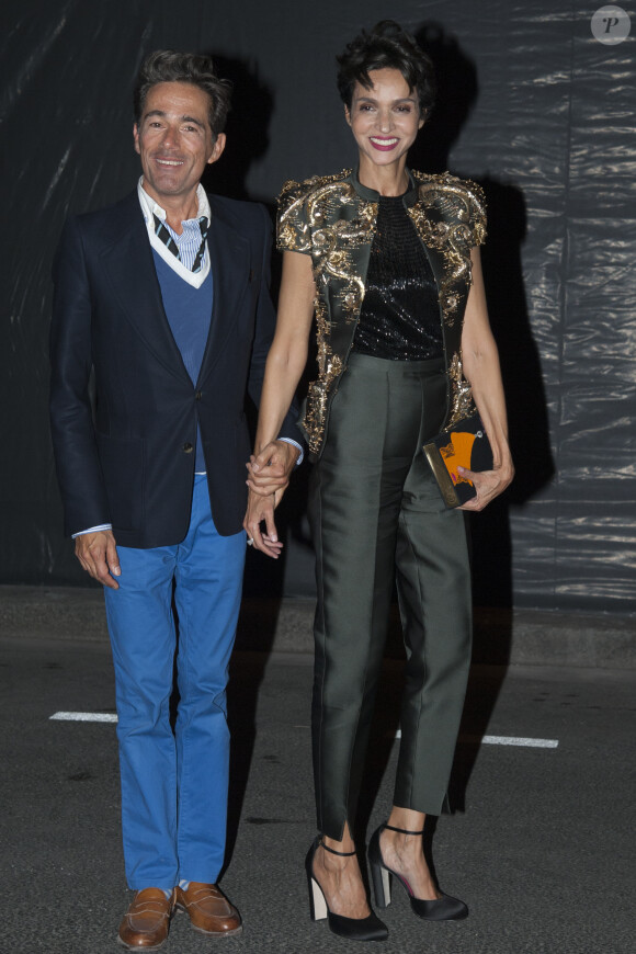 Vincent Darré et Farida Khelfa assistent à la soirée des 95 ans du magazine Vogue Paris, avenue d'Iéna. Paris, le 3 octobre 2015.