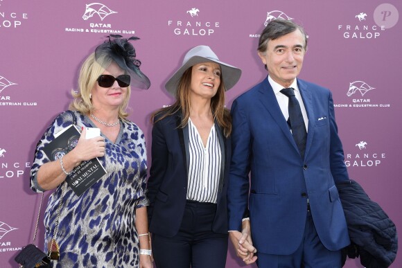 Guest, Philippe Douste-Blazy et sa compagne Marie-Laure Bec - Photocall du 94ème Qatar Prix de l'Arc de Triomphe à l'Hippodrome de Longchamp à Paris, le 4 octobre 2015.